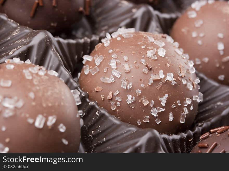 Truffle candy coated chocolate with decorative powdered for the occasion.