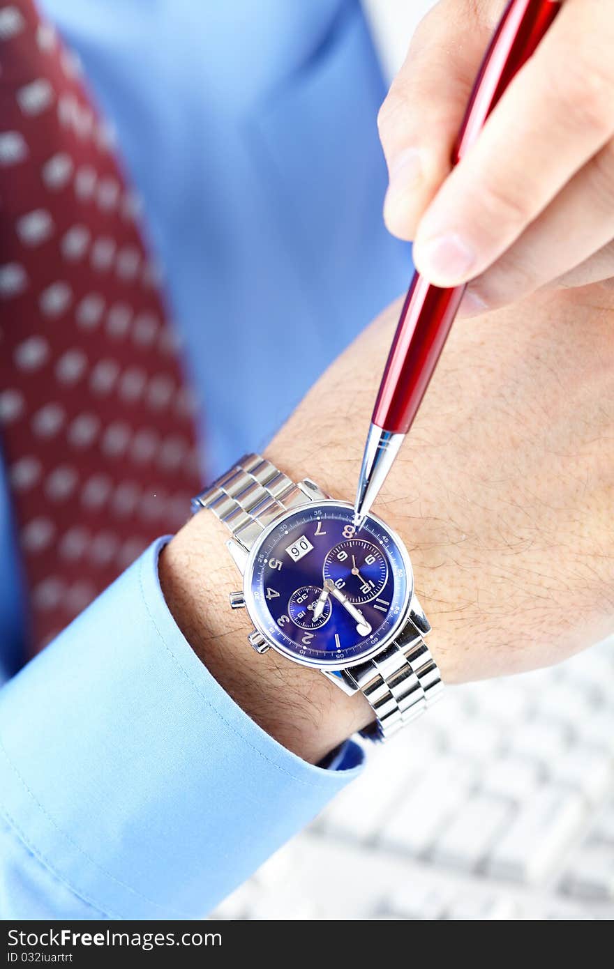 Businessman looking at the watch