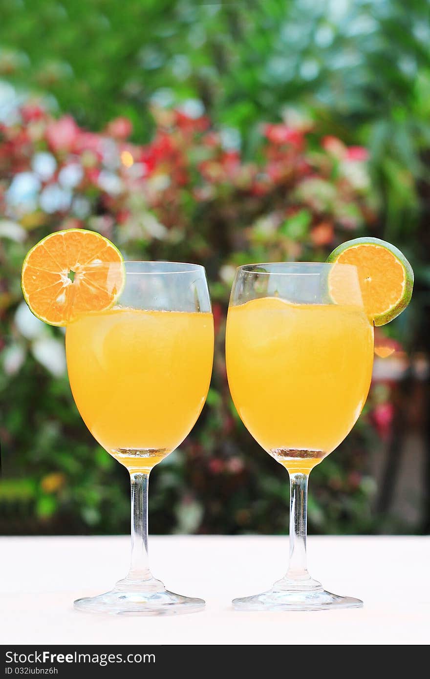 Close up of a couple glass of fresh orange juice