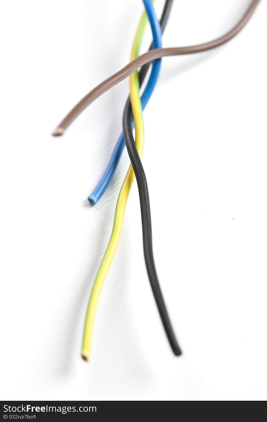 Colorful coils of cables on a white background