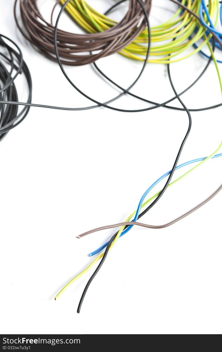 Colorful coils of cables on a white background