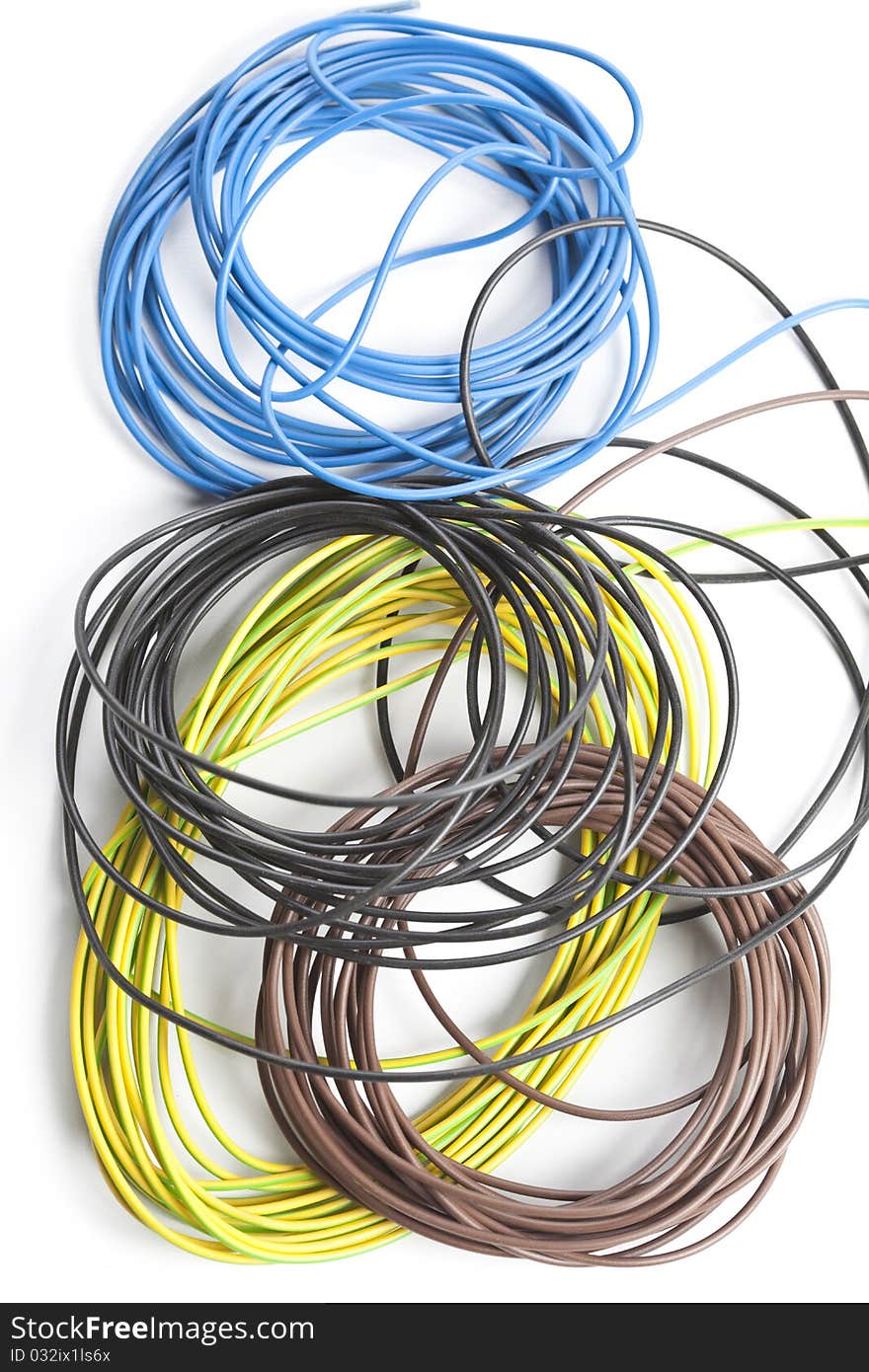 Colorful coils of cables on a white background