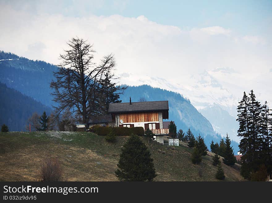 Chalet in alpine mountains spring. Chalet in alpine mountains spring