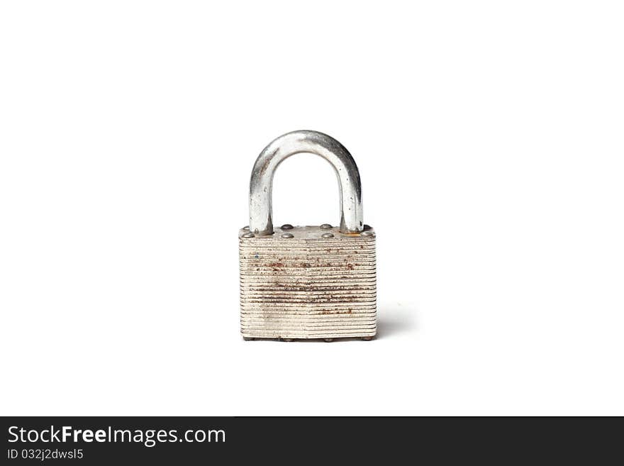 A rusty locked padlock on a white background. A rusty locked padlock on a white background