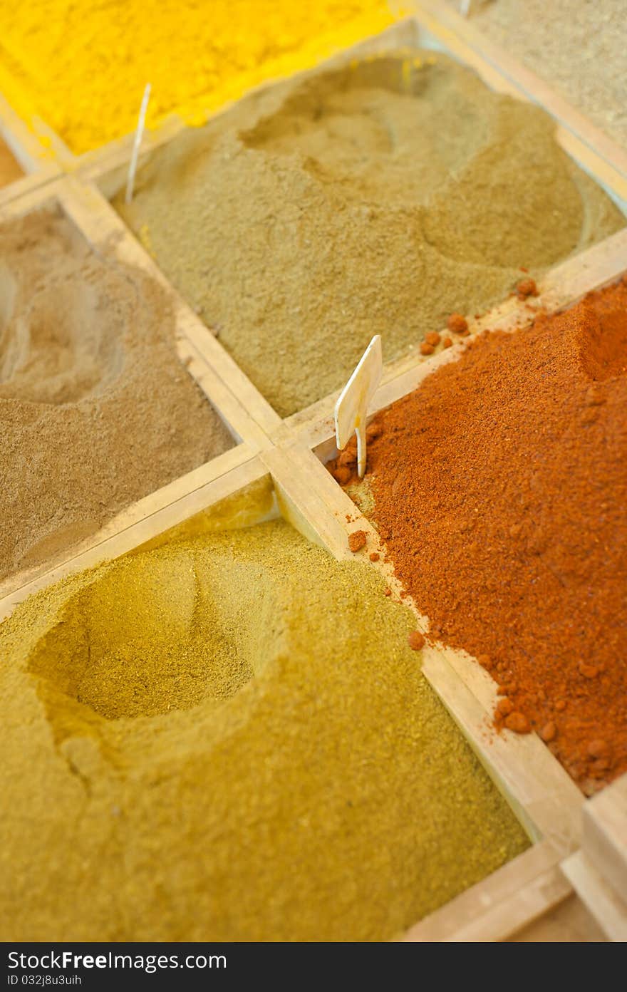 Brightly colored spices on sale in a market stall in the Old City of Jerusalem. Brightly colored spices on sale in a market stall in the Old City of Jerusalem.