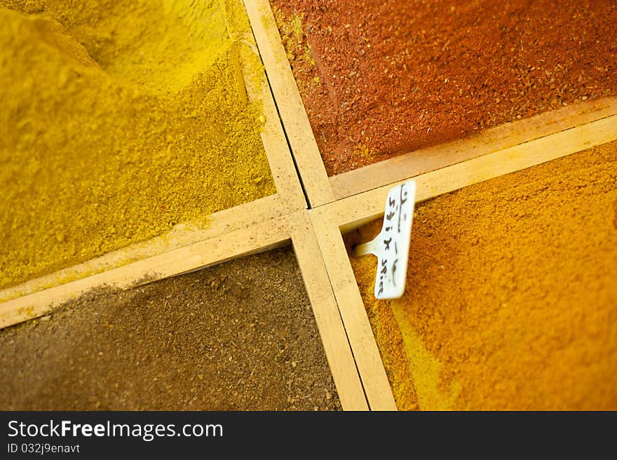 Brightly colored spices on sale in a market stall in the Old City of Jerusalem. Brightly colored spices on sale in a market stall in the Old City of Jerusalem.