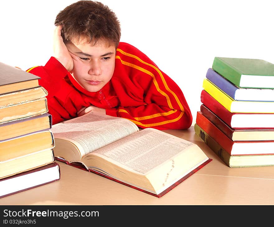 The boy with books in the library on a white background. The boy with books in the library on a white background