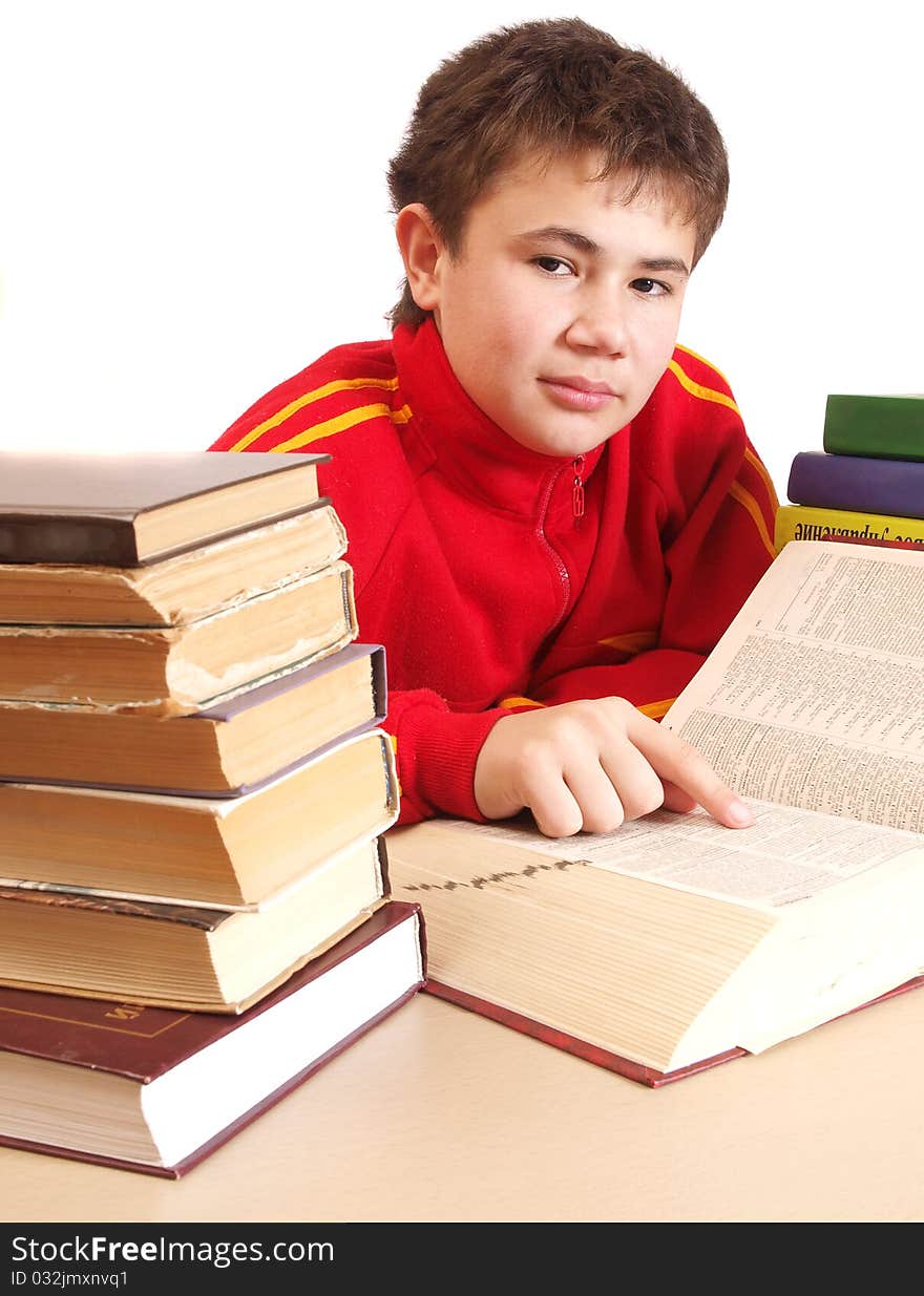 The boy with books in the library on a white background. The boy with books in the library on a white background