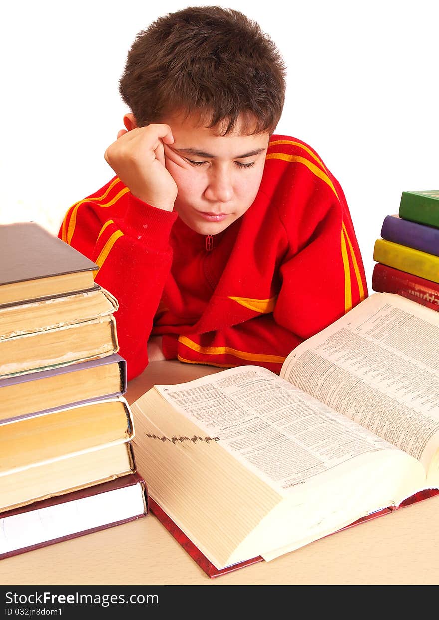 The boy with books in the library on a white background. The boy with books in the library on a white background