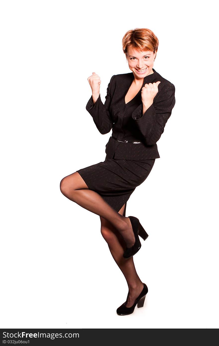 A young woman standing and showing thumbs up. A young woman standing and showing thumbs up