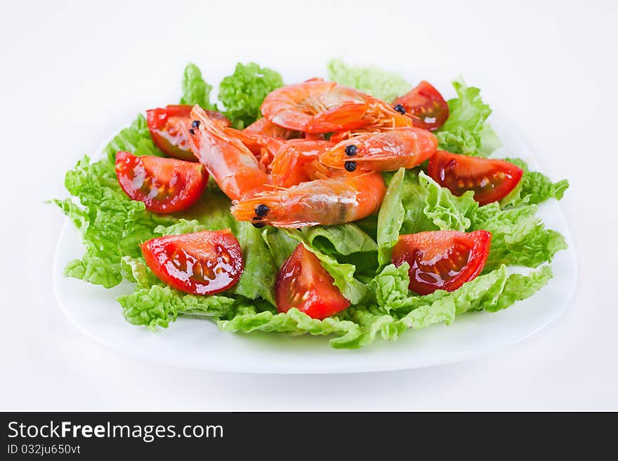 Shrimp with lettuce leaves and cherry tomato