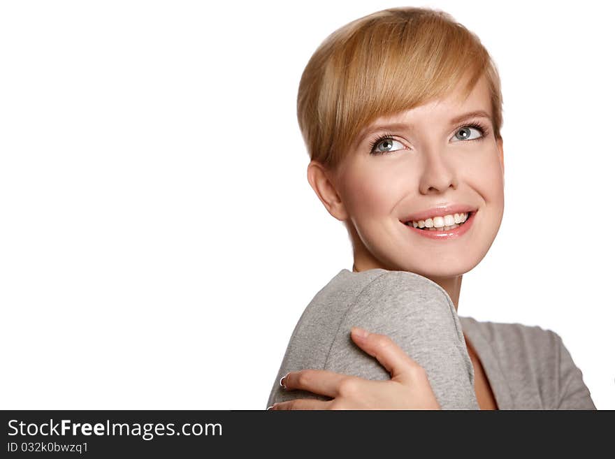 Portrait of a blond smiling woman looking at copyspace, isolated on white background. Portrait of a blond smiling woman looking at copyspace, isolated on white background