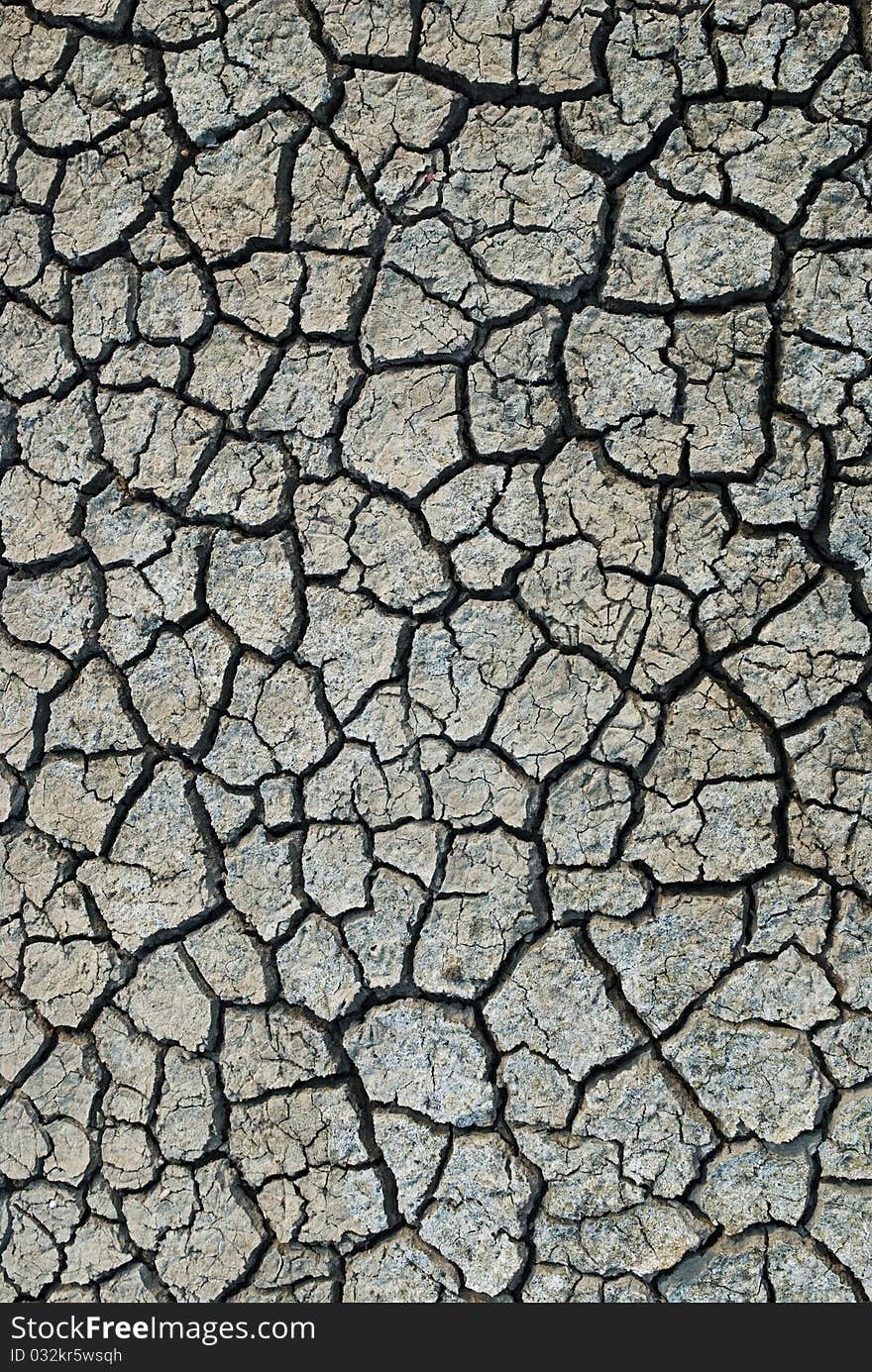 Dry and cracked earth background. Dry and cracked earth background