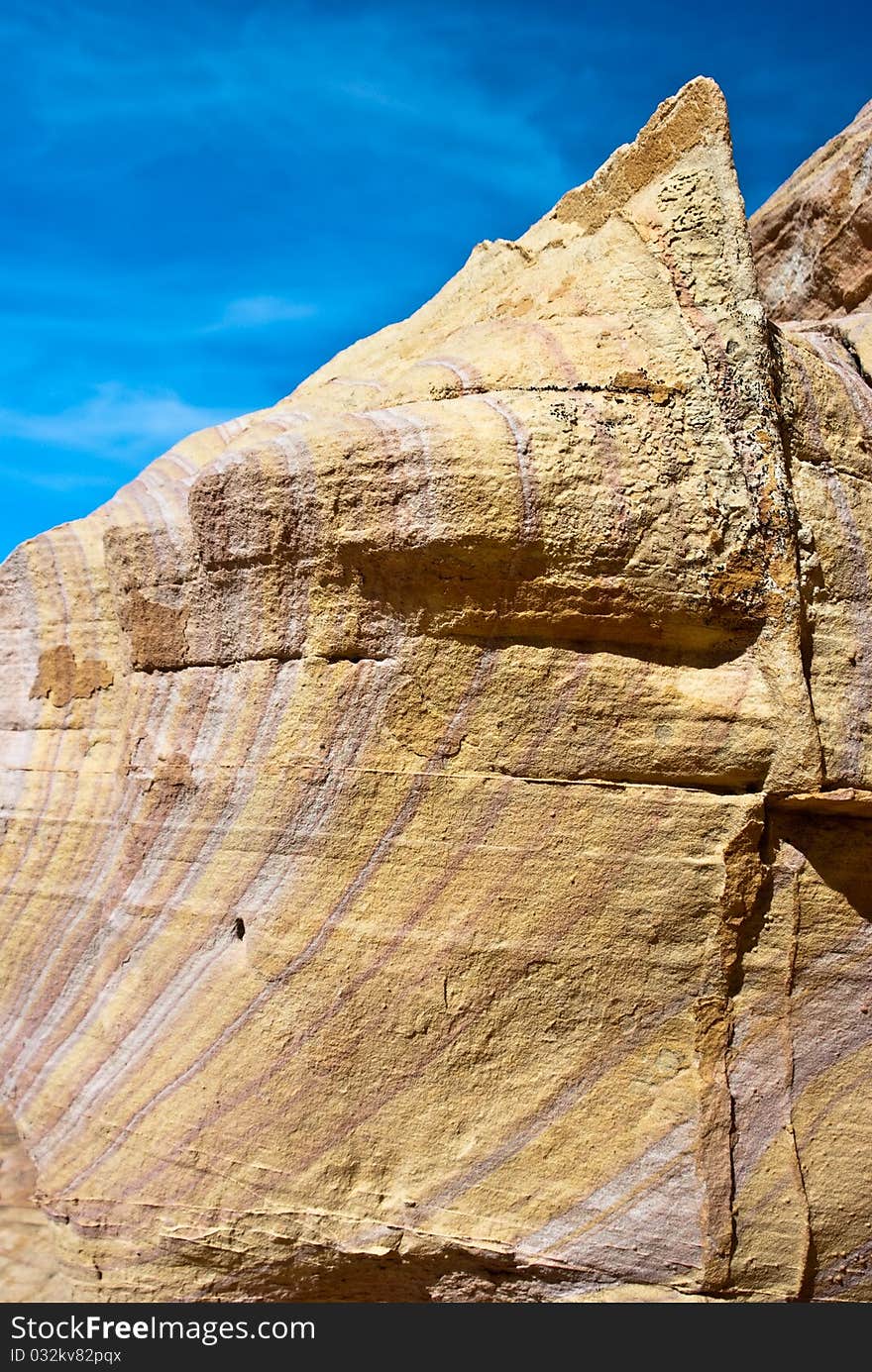 Sandstone rock formations imitate shark fins. Sandstone rock formations imitate shark fins