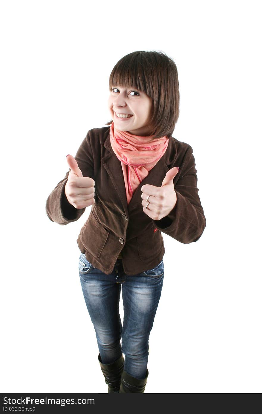 Closeup portrait of a beautiful young woman in a brown coat showing thumbs up sign