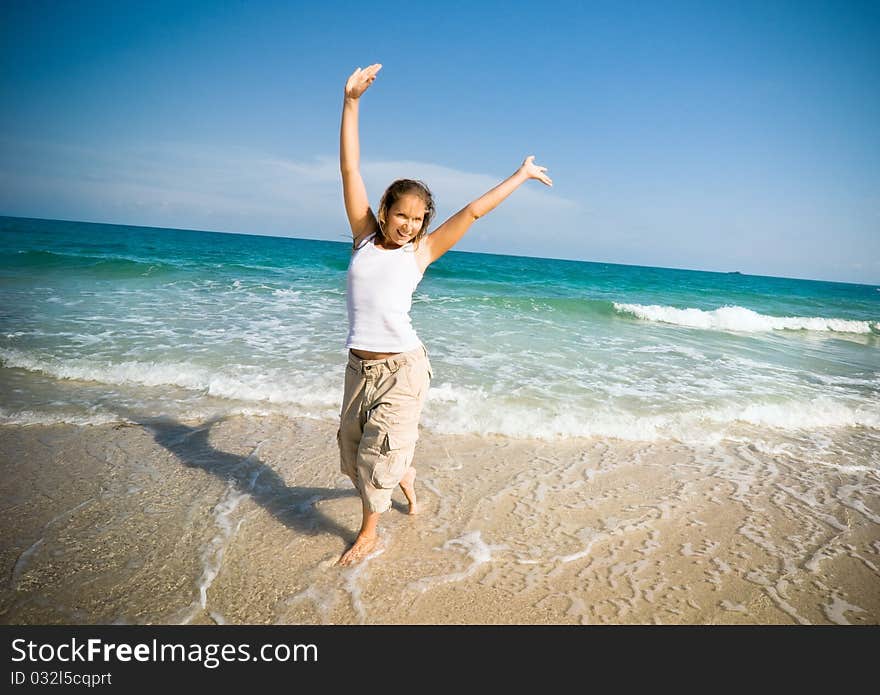 Woman running at the beach. Woman running at the beach