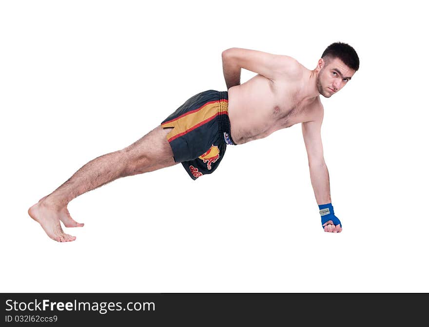 Young sportsman wrung out from a floor