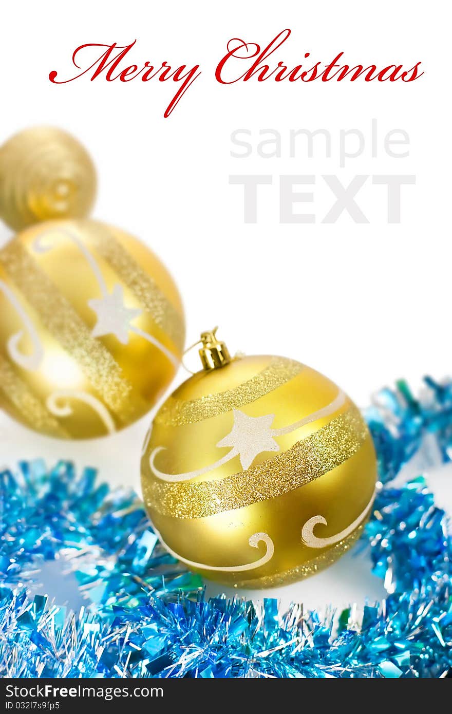 Yellow christmas decorations isolated on white background with copy space for text