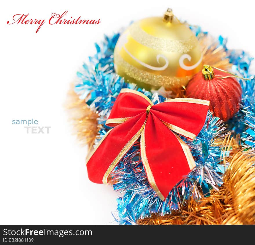 Christmas decoration baubles and red bow isolated on white background with copy space for text