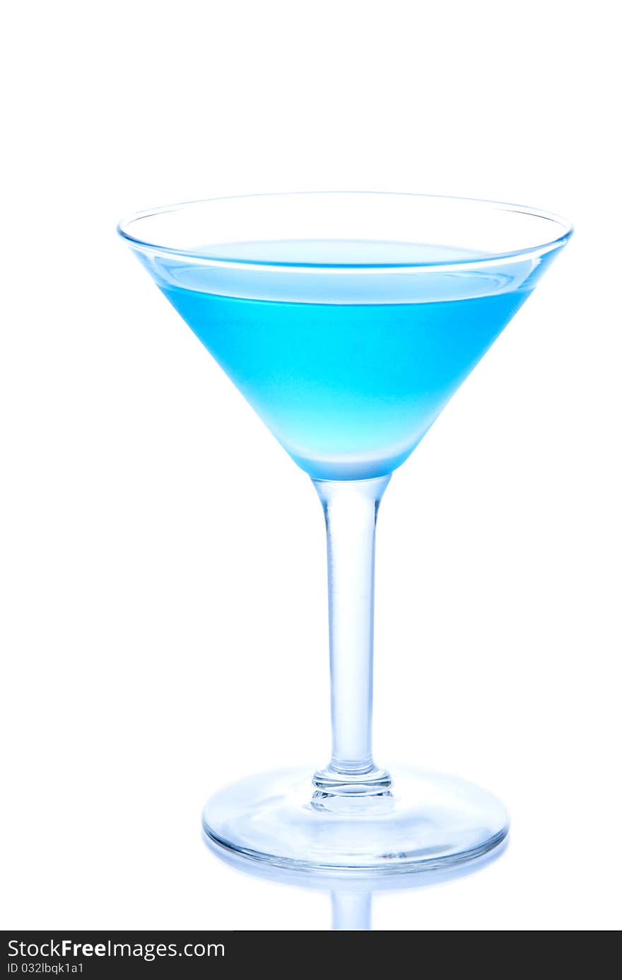 Blue Hawaiian Cocktails with cold vodka, light rum, gin, tequila, blue curacao, lime juice in martini glass isolated on a white background. Blue Hawaiian Cocktails with cold vodka, light rum, gin, tequila, blue curacao, lime juice in martini glass isolated on a white background