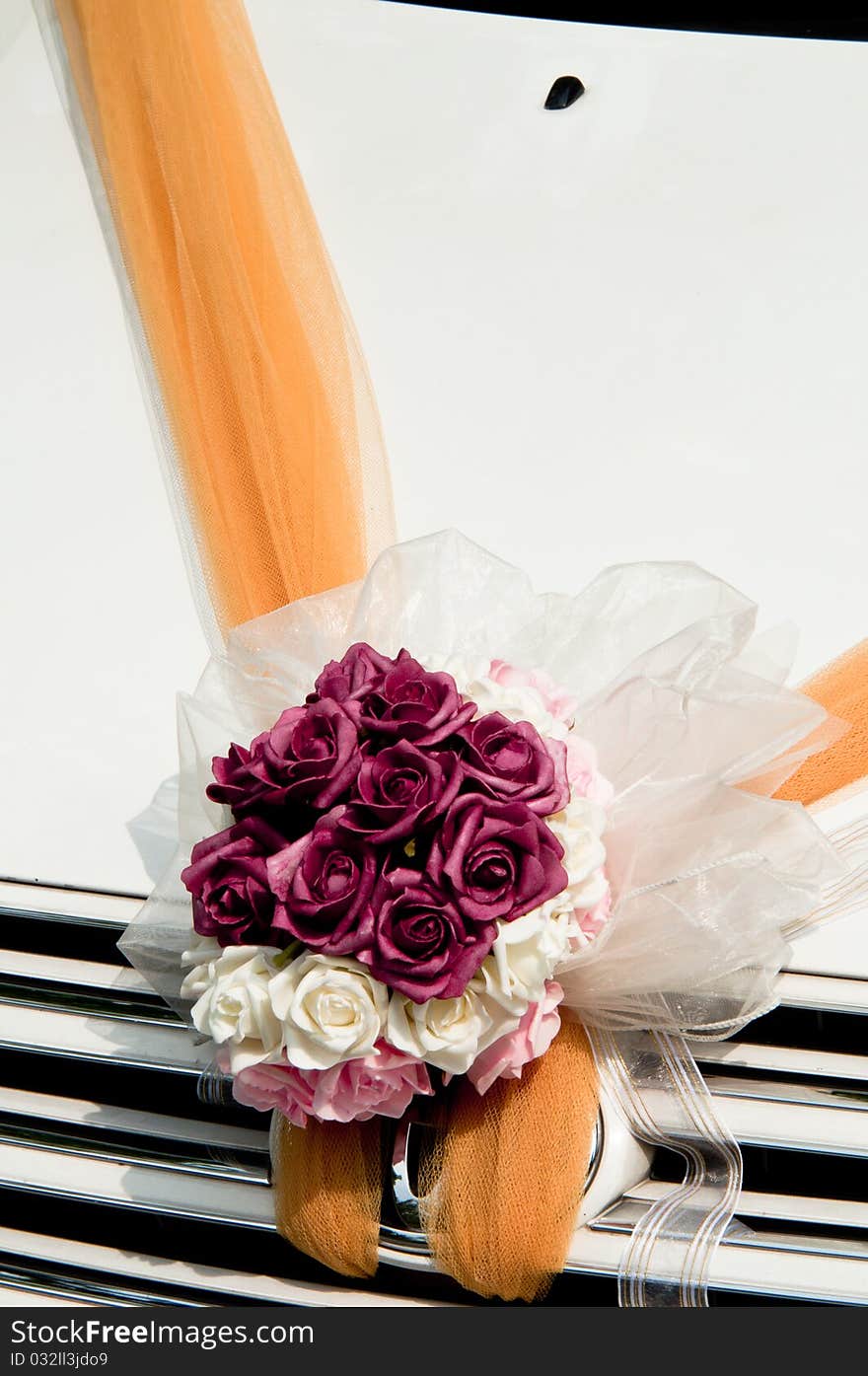 Flower bouquet on wedding car