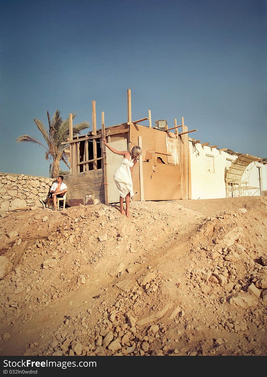 Groom and bride in desert