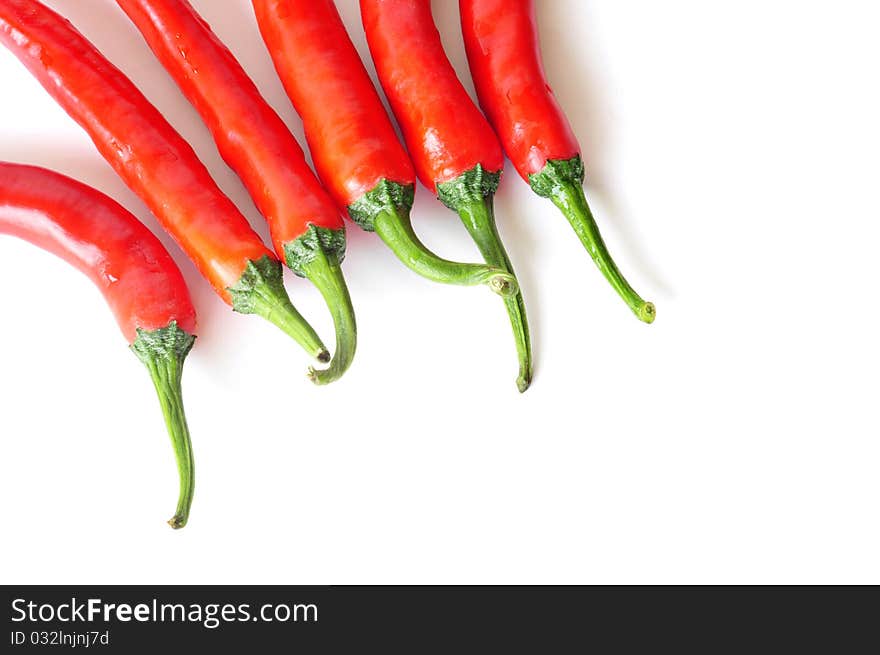 Red hot chili peppers isolated on white background. Red hot chili peppers isolated on white background