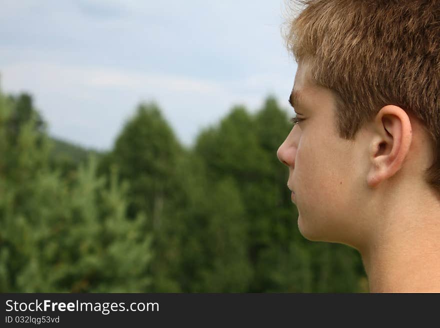 A boy portrait in the nature