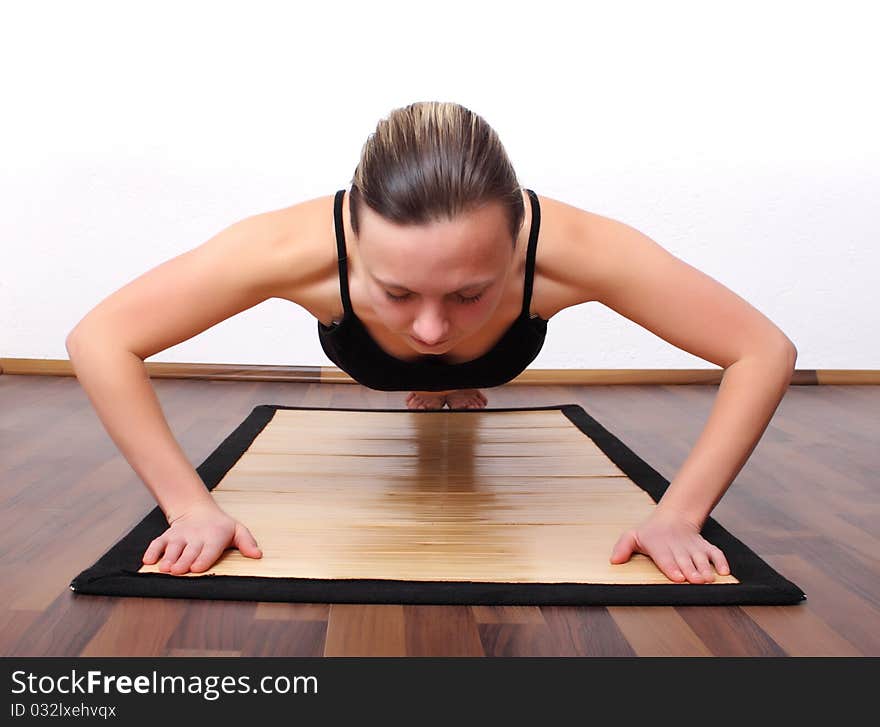 Woman pushed on the floor in the room. Woman pushed on the floor in the room