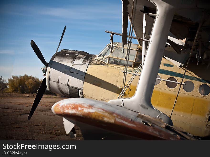 Discarded at the dump plane in an old airfield. propeller plane