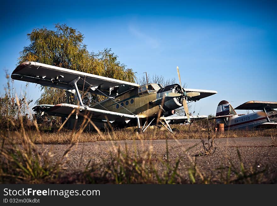 Discarded at the dump plane in an old airfield two plane