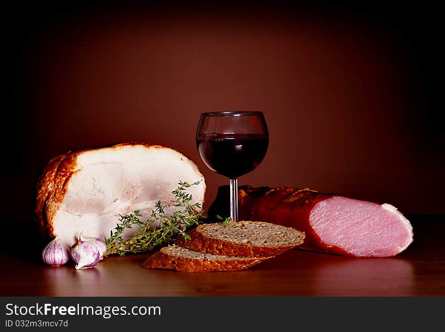 Noble food still life - wine, bread and meat