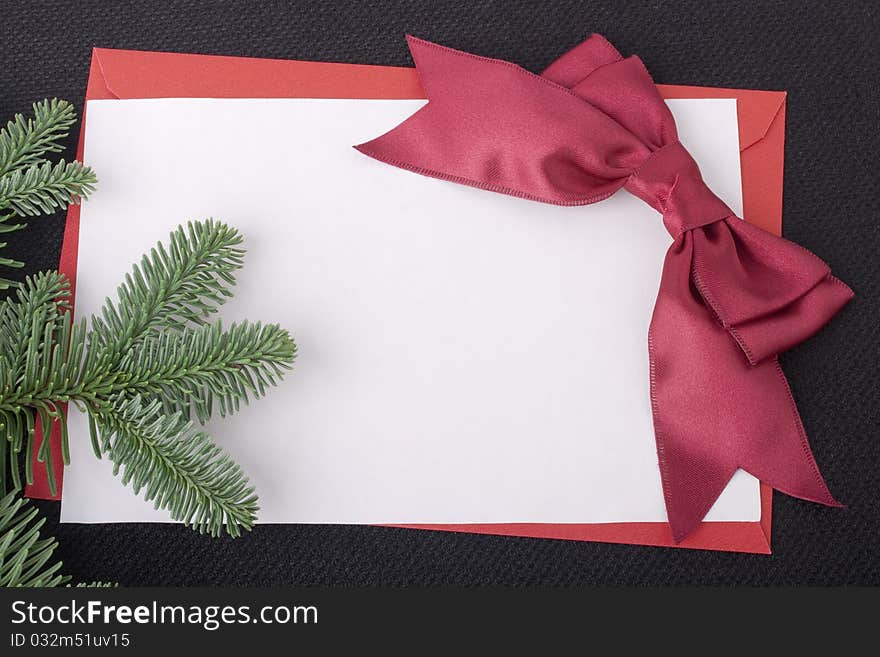 Congratulatory letter with a red envelope and a scarlet ribbon.