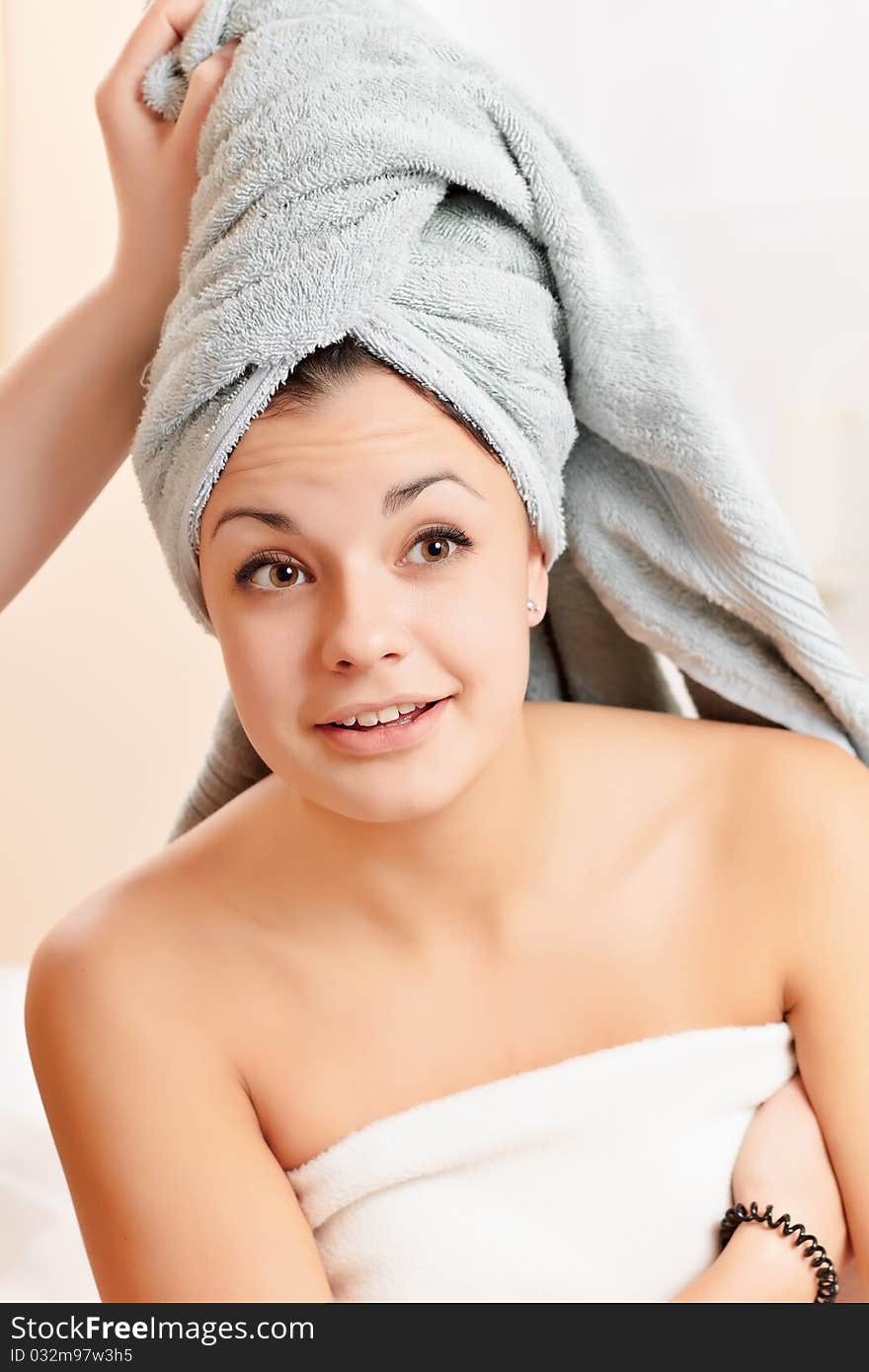 Portrait of young girl in towel