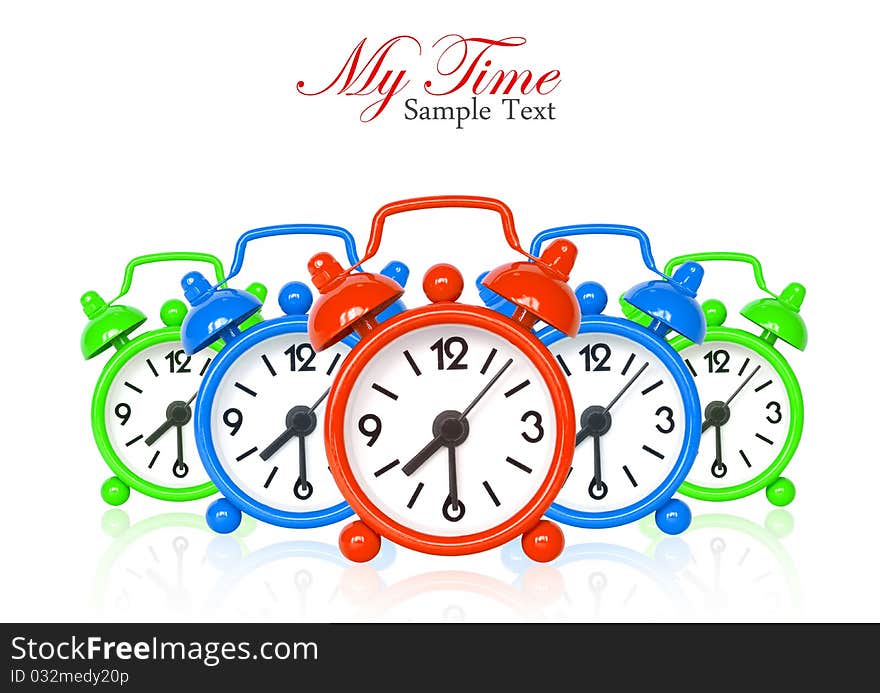 Multi color alarm clocks on white with copy space