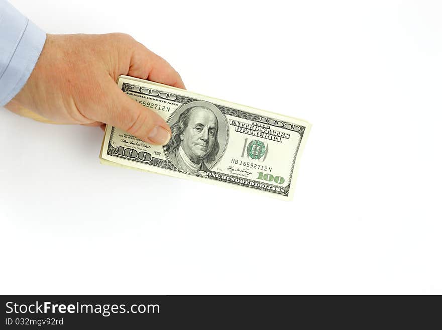 Dollars in a hand of the businessman on a white background