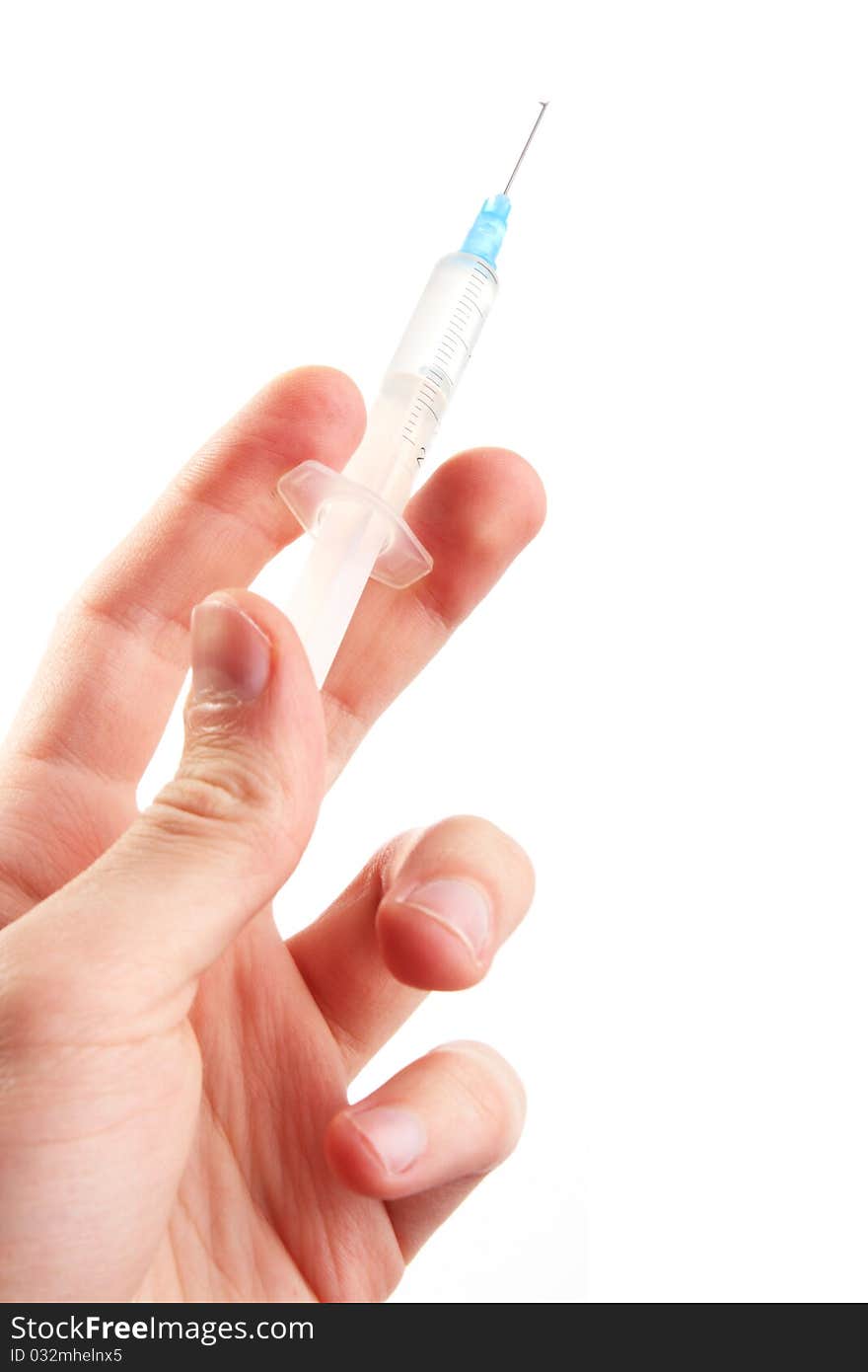 Hand hold a syringe. on white background, isolated. Hand hold a syringe. on white background, isolated