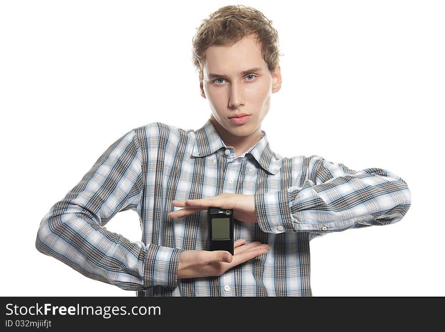 Young man with mobile phone over white