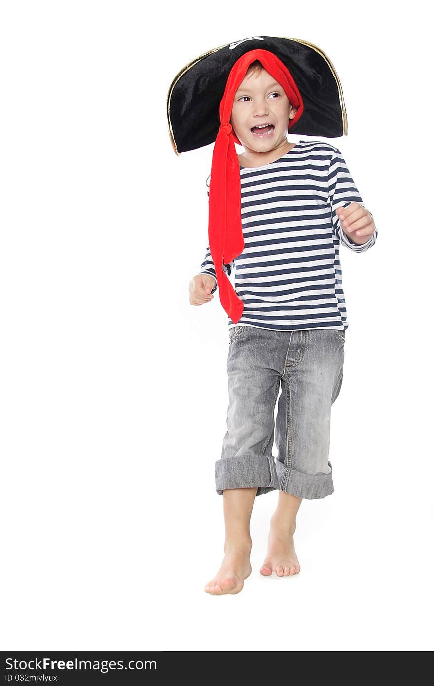 Boy dressed as pirate over white