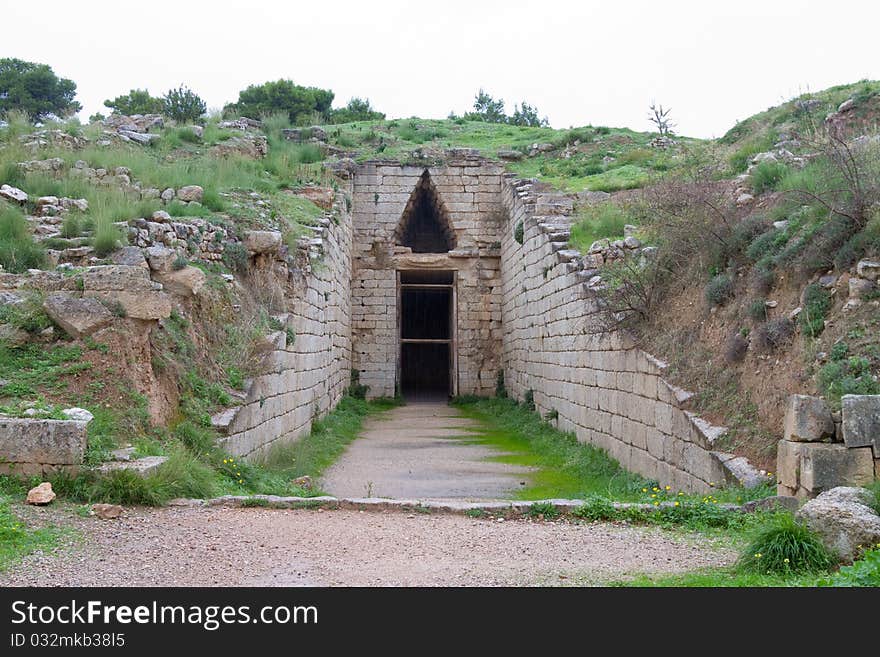 The entrance to Klytemnestra Tholos Tomb in the ancient Mycenae, Greece. The entrance to Klytemnestra Tholos Tomb in the ancient Mycenae, Greece