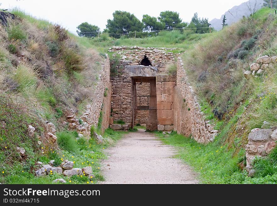 The entrance to Aegisthus Tholos Tomb in the ancient Mycenae, Greece. The entrance to Aegisthus Tholos Tomb in the ancient Mycenae, Greece