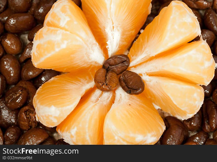 Coffee beans and tangerine