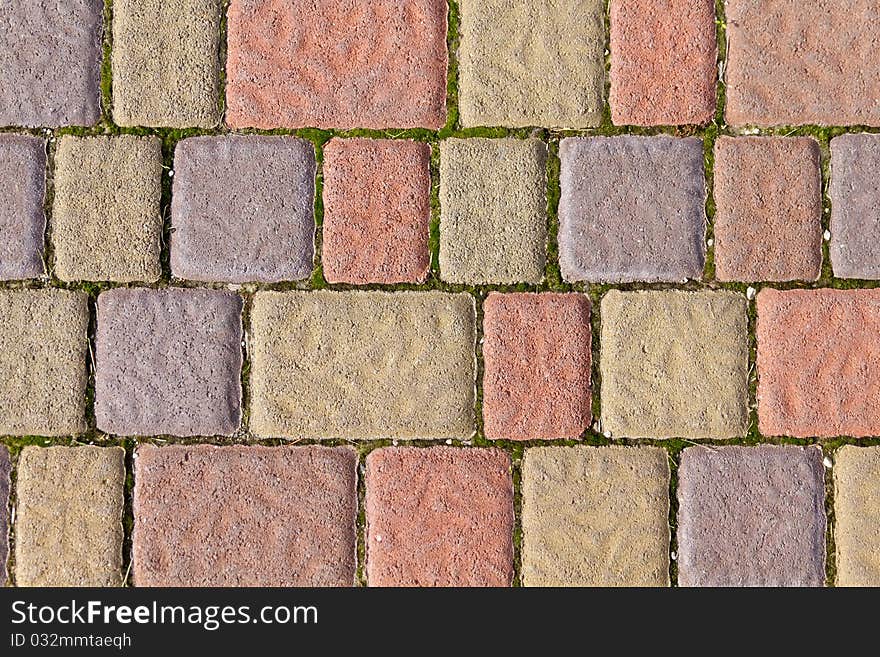 Colorful sidewalk bricks on the beach