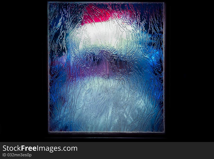 Santa Claus behind the glass or Santa Claus is frozen in ice
