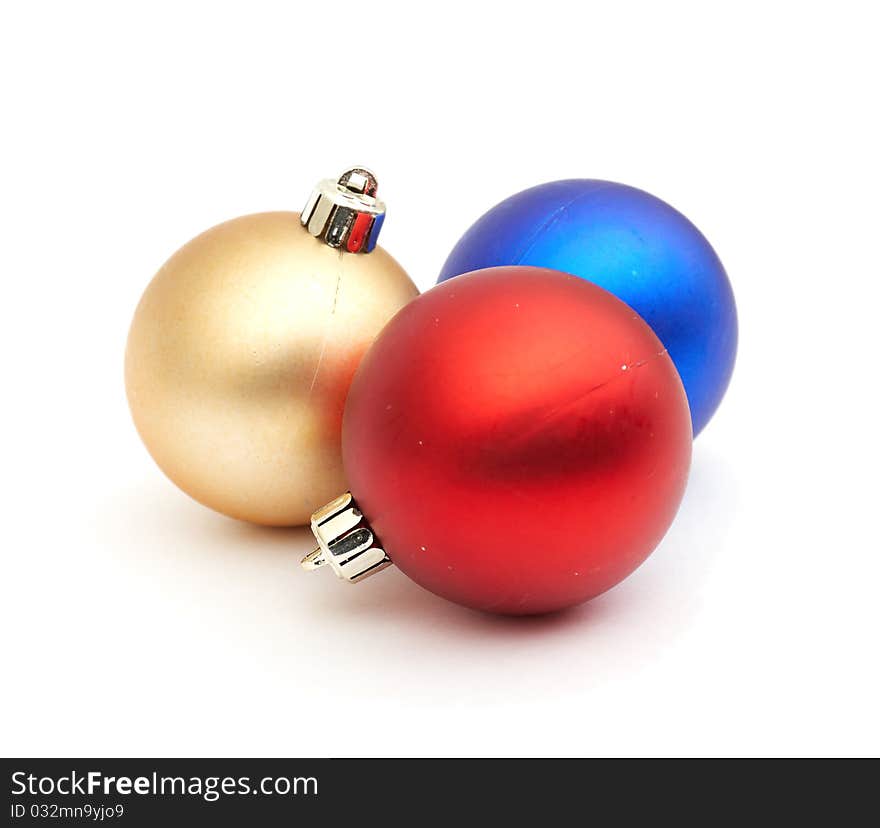 Red and blue christmas blubs on white background