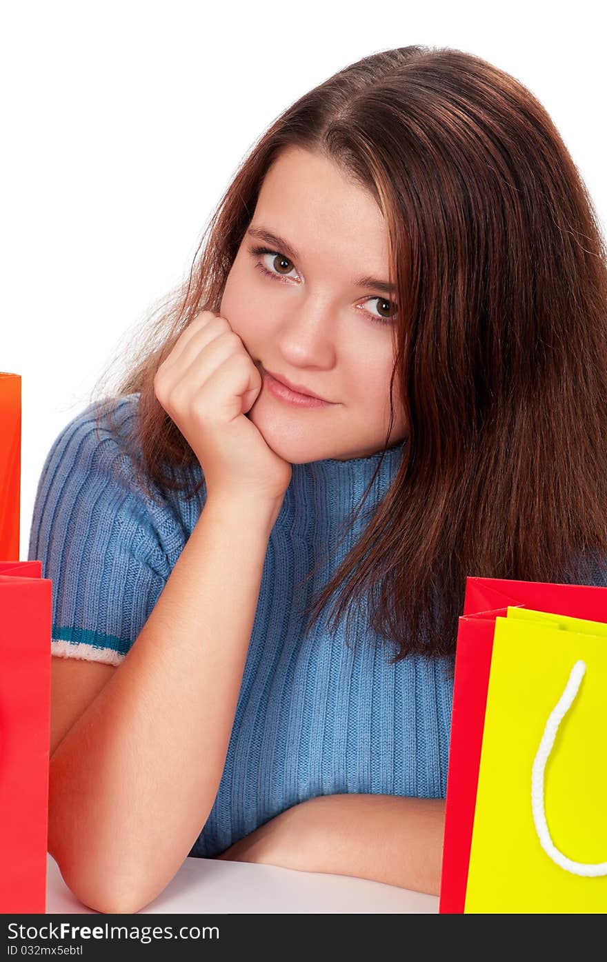 Portrait of beautiful girl with shopping bags