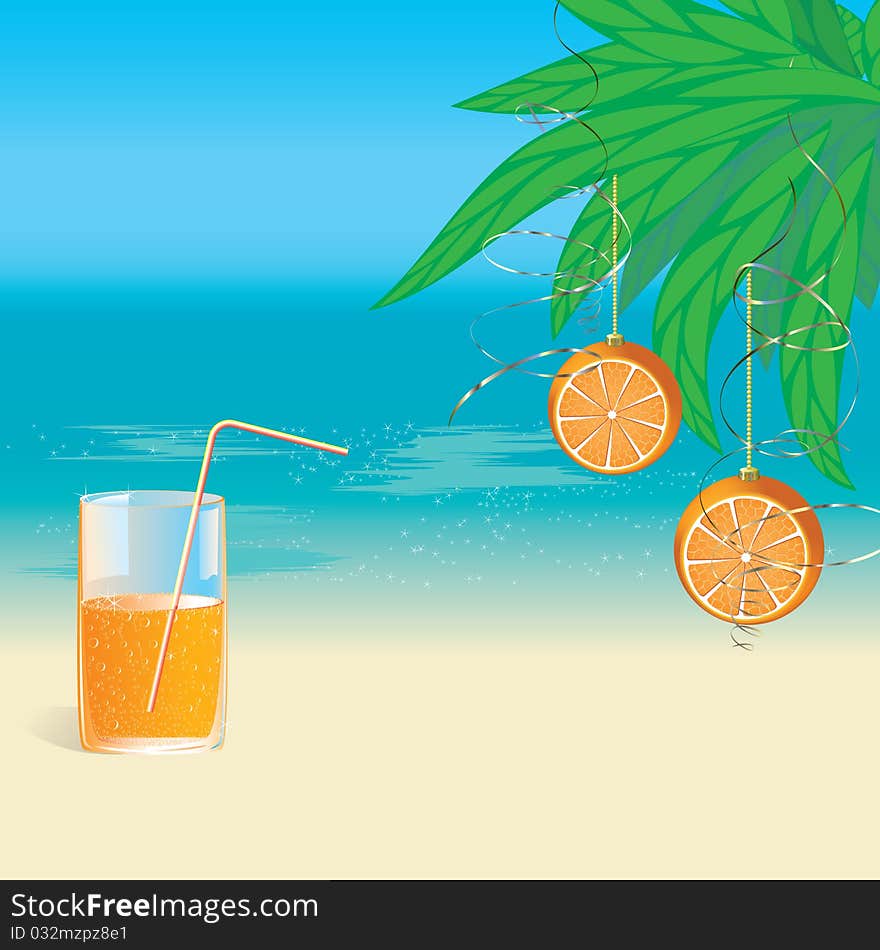 A glass of orange juice and oranges hanging on palm branches