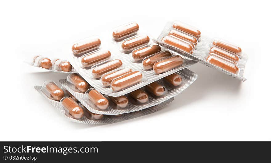 Medicine tablets and medicine equipment isolated on white