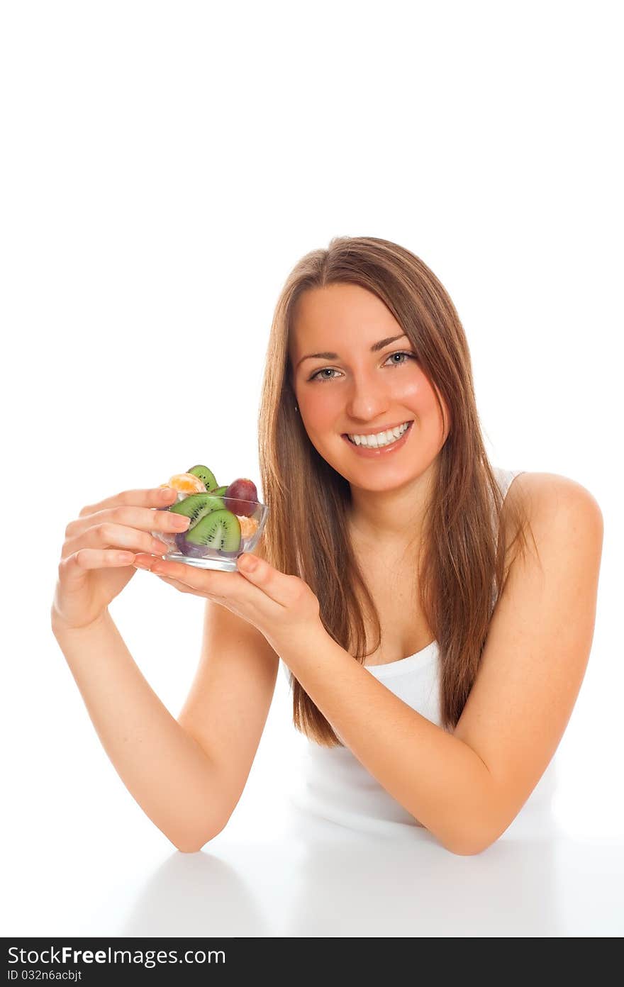 Beautiful woman with fruit on a white background