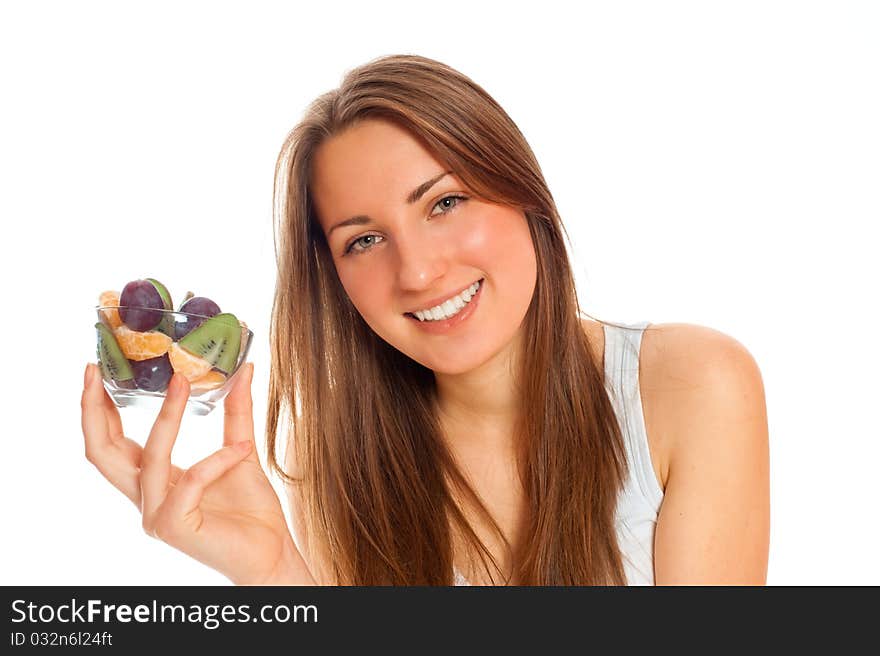 Beautiful woman with fruit on a white background